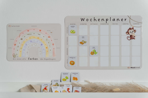 Mealomat Dino-Rezeptmagnete am Wochenplaner, ein Geschenk, das Kinder spielerisch einbezieht