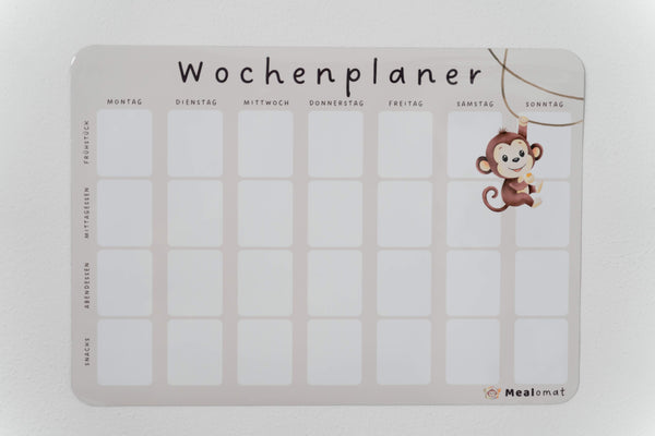 Magnetischer Mealomat A3 Wochenplaner an einer weißen Wand, beschreibbare Planungstafel für die Familienküche